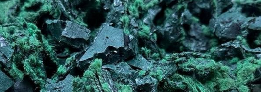 A pile of green rubber chippings